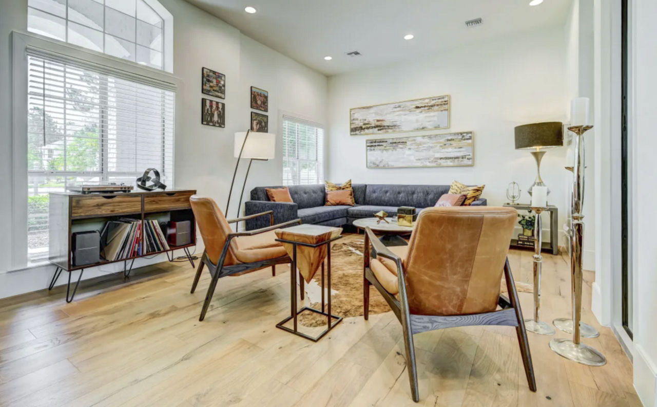 Tan chairs near a gray couch | Blog | Greystar 